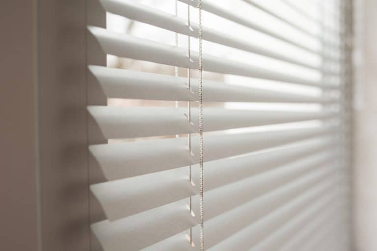 Lighter blinds blend naturally with soft contrast and can make smaller spaces feel larger. Darker blinds command attention, diverting the eye from other aspects of the room. Blinds can be a shade lighter or darker than the walls as long as they complement the rest of the room.