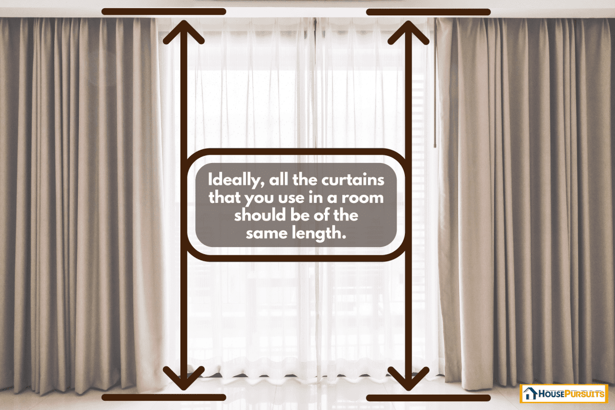 photo of a room curtain with same length and color brown curtain big window, Should All Curtains Be The Same Length?
