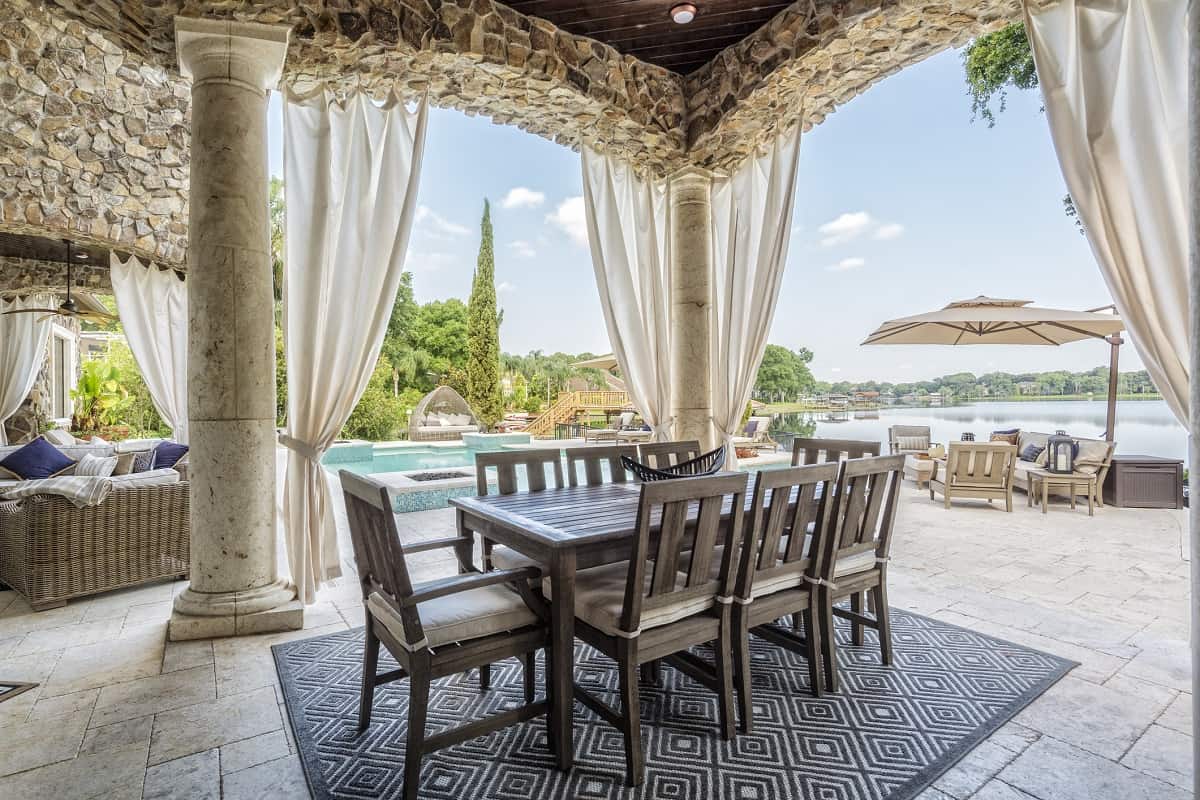Heavier Fabric - Beautifully designed outdoor living area at an estate home with a view overlooking a lake