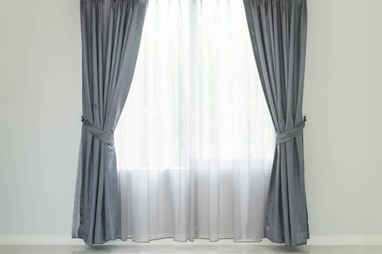 A curtain interior decoration in living room, How Far Should Curtains Be Off The Floor?