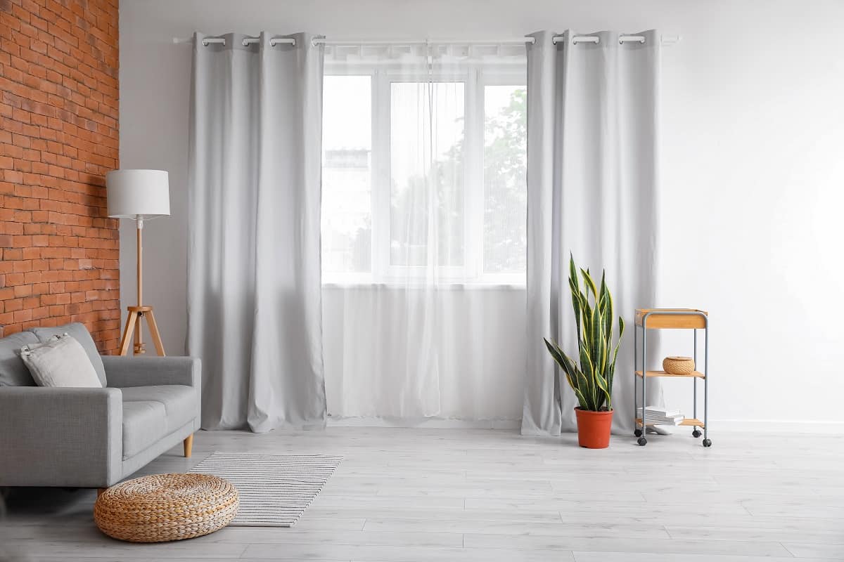 Do Curtains Have To Go To The Floor - Interior of modern room with light curtains