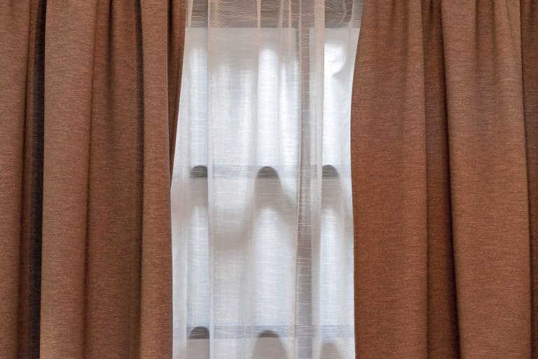 Double-layer curtains in brown blackout fabric and white tulle - Will Blackout Curtains Keep Heat Out