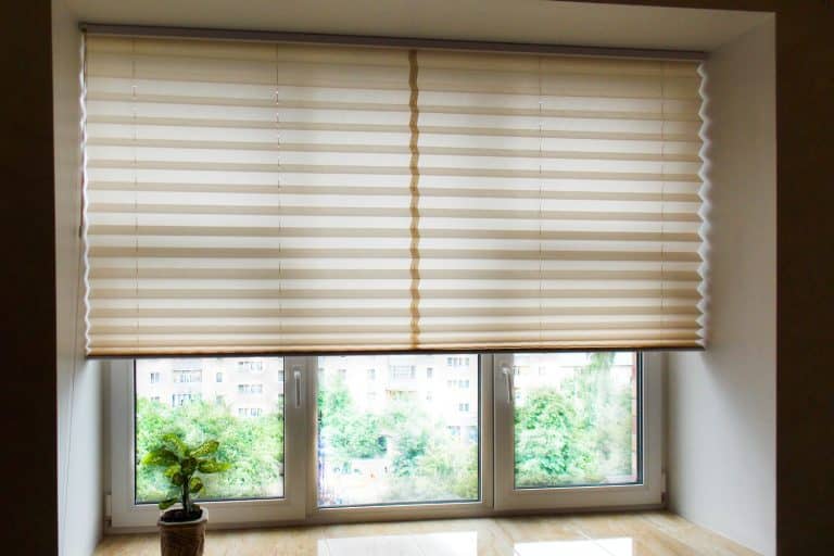 Pleated blinds XL, beige color, with 50mm fold closeup in the window opening in the interior. Home blinds - modern bottom up privacy shades half raised on apartment windows. - How To Hang Blinds In An Aluminum Sunroom (Inc. Without Drilling Holes)