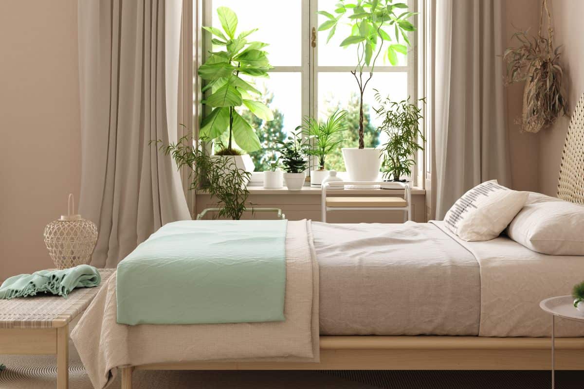 Scandinavian bedroom interior with bed in pastel beige and mint colors, 3d rendering

