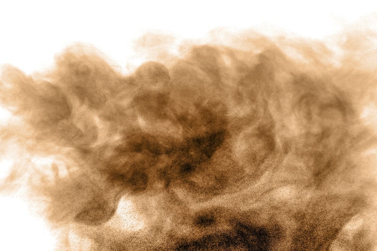 Soot - Brown black dust powder explosion. The texture is abstract and splashes float