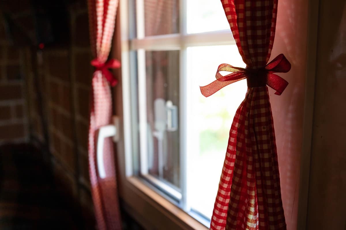 Tie Up The Curtain With A Ribbon - Window with red and white checkered curtain. Indoors design