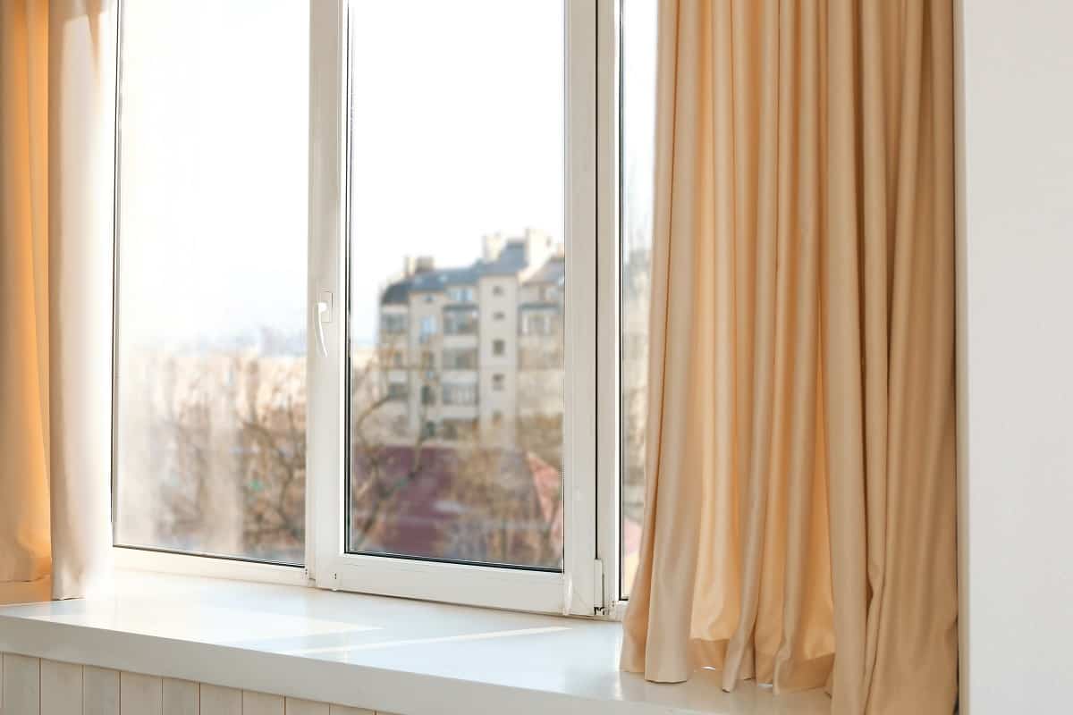Window Sill Curtains - Room window with light curtains