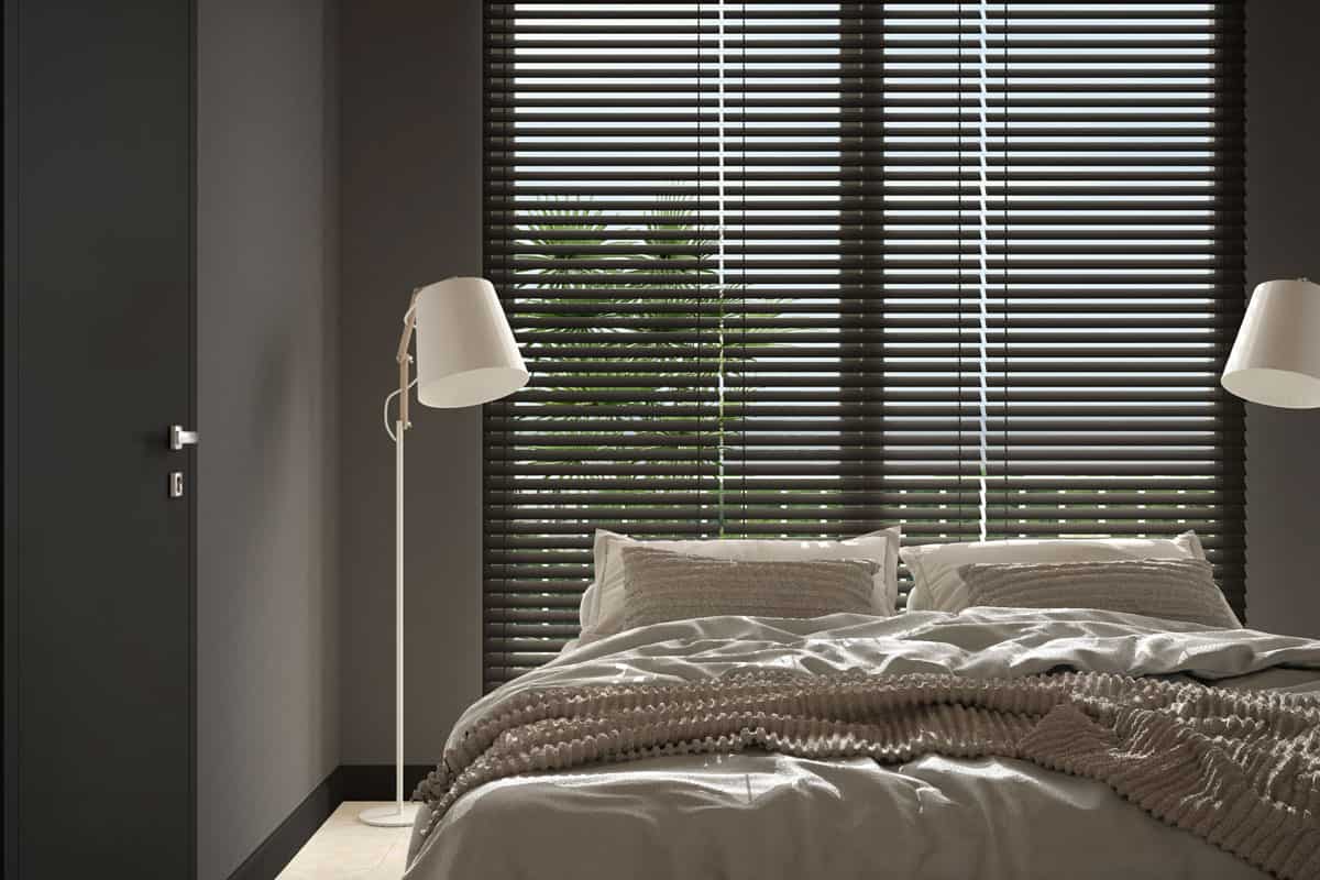 photo of a cosy-wooden-peaceful-bedroom-dark-tones