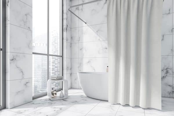 photo of a modern-bathroom-interior-having-oval-white, How Long And Wide Should Shower Curtain Be?