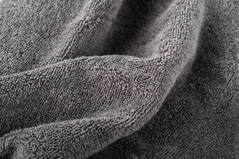 Up close photo of a gray towel, Why Are My Gray Towels Turning Orange?